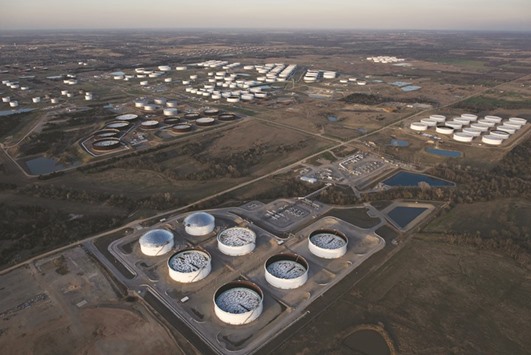 Oil storage tanks at Cushing, Oklahoma. At least five refiners have voluntarily cut output of gasoline and distillate, moves that may deepen crudeu2019s prolonged rout as storage tanks at Cushing near capacity.