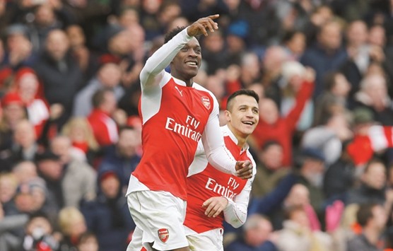 Danny Welbeck celebrates scoring the second goal for Arsenal.