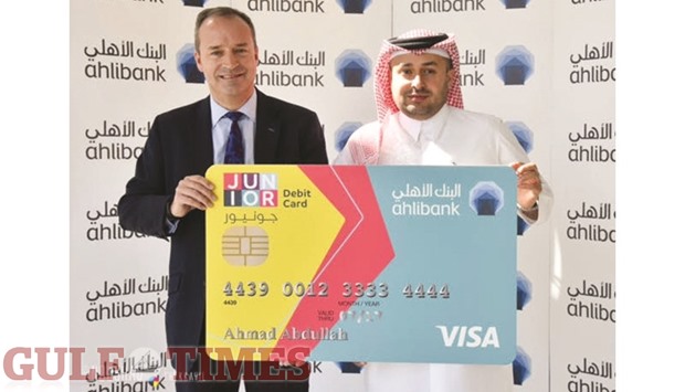 McKechnie with Alfrangi (right) launching the u2018Junior Savings Accountu2019 at the Ahlibank headquarters. PICTURE: Noushad Thekkayil