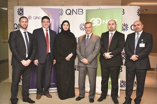QNB, NCR officials at the launch of Aptra Interactive Teller Machine at Al Sadd branch.
