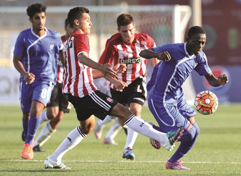 Action from the match between Estudiantes de La Plata (in red and white) and Aspire Academy yesterday.