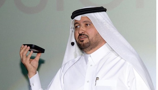 Ooredoo Qatar CEO Waleed al-Sayed holds the company's latest cable box at the launch of the Ooredoo TV service on Monday. PICTURE: Thajudheen.