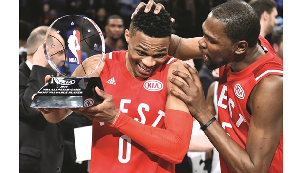 Western Conference guard Russell Westbrook of the Oklahoma City Thunder (L) celebrates with teammate Kevin Durant after being named MVP of the NBA All Star Game at Air Canada Centre. PICTURE: USA TODAY Sports