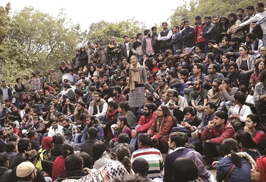 Students of Jawaharlal Nehru University attend a protest inside the university campus yesterday.