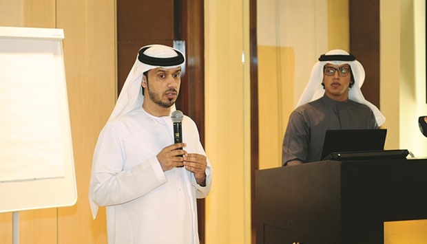 Sultan al-Mansoori, left, speaking to reporters during a road show in Doha yesterday. PICTURE: Najeer Feroke