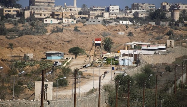 Egyptian soldier keeps guard on the border between Egypt and southern Gaza Strip