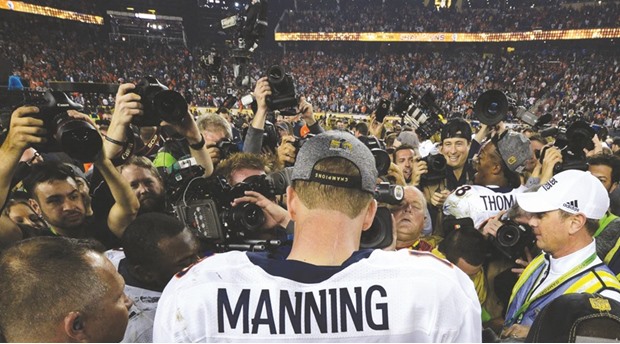 File picture of Denver Broncosu2019 Peyton Manning being mobbed by the media after his team won the Super Bowl 50.