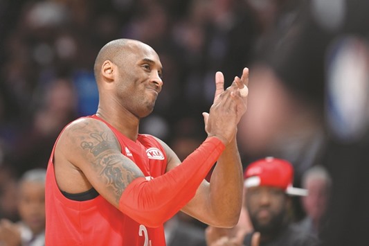 Western Conference forward Kobe Bryant of the Los Angeles Lakers (24) applauds the fans after coming off during the NBA All-Star game.