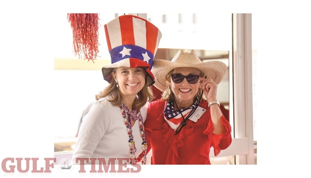 American members Lora Lyn Frederick, left, and Mindee Jones Poldrack strike a pose.    Photos by Noushad Thekkayil