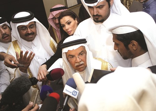 Saudi Arabiau2019s Oil Minister Ali al-Naimi (centre) and Qataru2019s Energy Minister HE Dr Mohamed bin Saleh al-Sada speak to the media following a meeting with Russiau2019s Energy Minister Alexander Novak, and Venezuelau2019s Oil Minister Eulogio del Pino in Doha yesterday. Saudi Arabia and Russia, the worldu2019s biggest crude oil producers, yesterday joined Venezuela and Qatar in an agreement to freeze output in an effort to revive prices from a 12-year low.