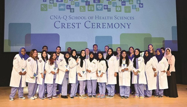 Students pose for a photo after the Crest Ceremony.
