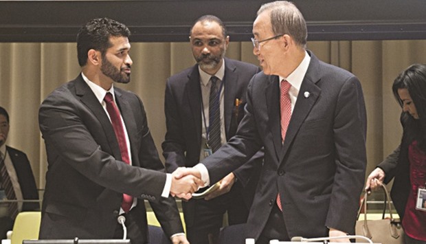 SC Secretary General Hassan al-Thawadi shaking hands with UN secretary general Ban Ki-moon