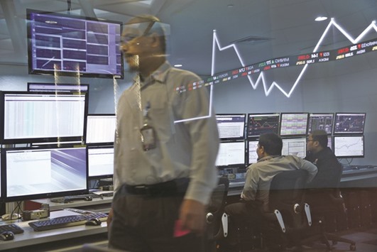 Employees gather near screens in the control room at the Indonesia Stock Exchange (IDX) in Jakarta. Foreign investors have pumped $181mn into the bourse this year, the only net inflows recorded among eight Asian markets.