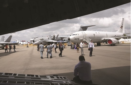 US Air Force Boeing P-8 Poseidon (right) is displayed at the Singapore Airshow. The market for spy planes and surveillance platforms is buoyant in Southeast Asia, where countries are facing off against China u2013 and each other u2013 in the resource-rich South China Sea, industry insiders said yesterday.
