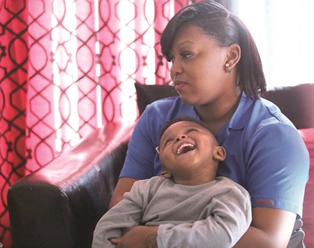 SAFETY NET:  Jabbar with his mother Tamara Atwell at their Orlando home.