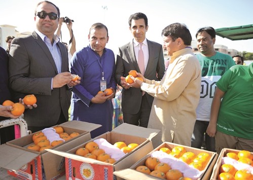 Ambassador of Pakistan to Qatar Shahzad Ahmad at the mandarin stall.