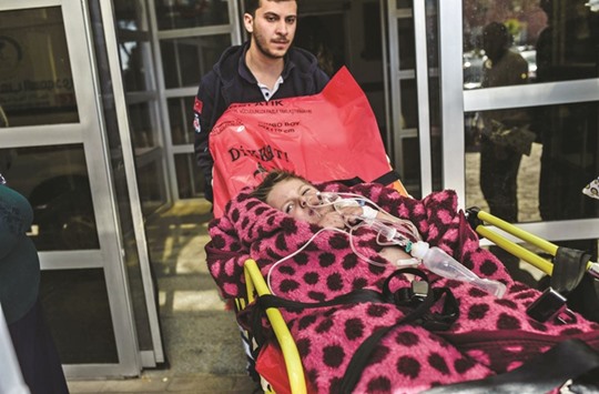 An injured northern Syrian child is carried on a stretcher at the southern Turkish border town of Kilis hospital, as bothTurkey and Russia have stepped up their bombardments in Syria. Turkish artillery has struck at Kurdish militia targets in Syria over the past few days, putting Ankara at odds with the US which supports the Syrian Kurds fighting Islamic State militants.