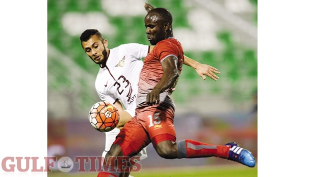 Lekhwiya striker Alain Dioko (R) in action during his teamu2019s QSL match against El Jaish yesterday. PICTURES: Noushad Thekkayil