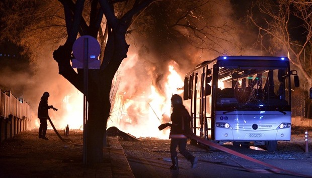 Firefighters prepare to extinguish fire after an explosion in Ankara