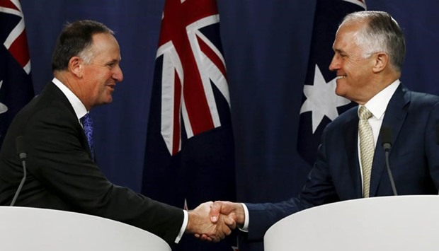 New Zealand Prime Minister John Key (left) shakes hands with Australian Prime Minister Malcolm Turnbull during their joint news conference in Sydney on Friday.