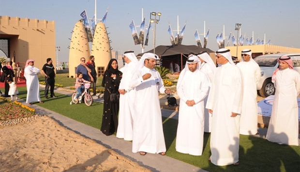The dignitaries take a tour of the festival venue