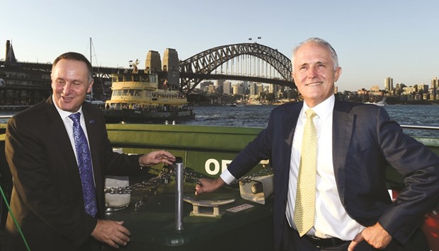 Australiau2019s Prime Minister Malcolm Turnbull and New Zealand Prime Minister John Key (left) travel on a ferry in Sydney Harbour yesterday.