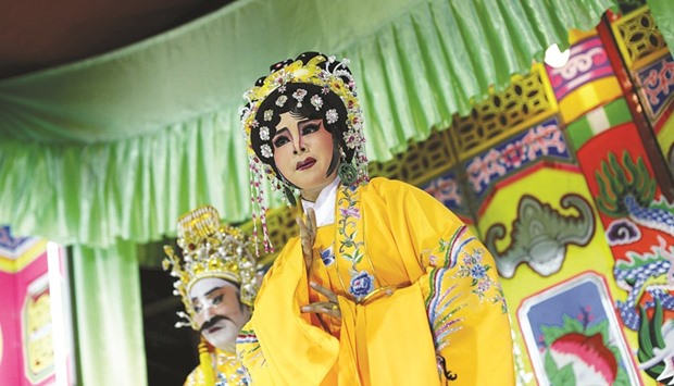 A Chinese opera actress performs in Chinatown in Bangkok.
