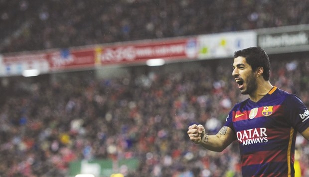 File picture of Barcelonau2019s Luis Suarez celebrating after scoring a goal during the La Liga match against Real Sporting de Gijon.