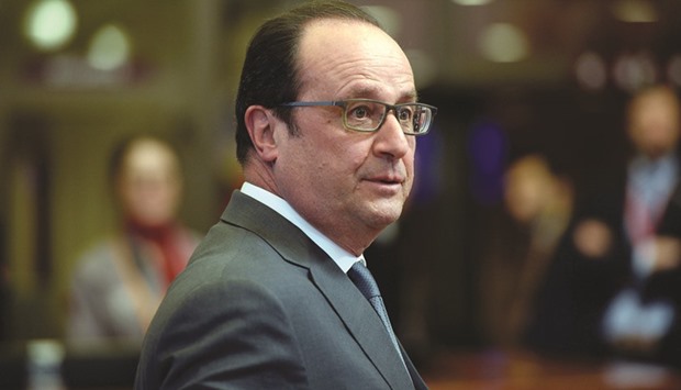 President  Hollande: wants pressure on Moscow for negotiations.