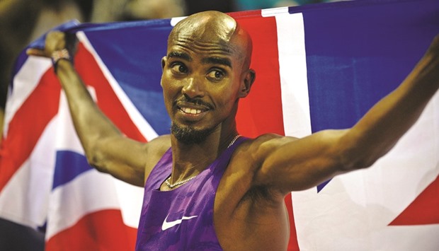 Britainu2019s Mo Farah celebrates after winning the 3000m at the Glasgow Indoor Grand Prix at the Emirates Arena in Glasgow. (AFP)