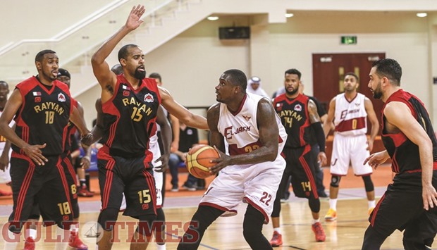 Action from the match between Al Rayyan (red and black ) and El Jaish at the Al Gharafa Indoor Hall yesterday.