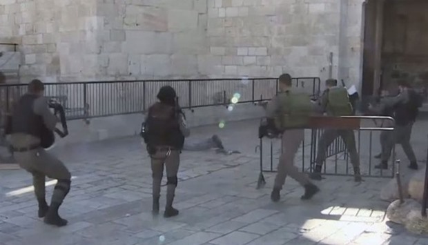 Image grab from Al Jazeera video of a Damascus Gate assailant being shot dead in Jerusalem's Old City