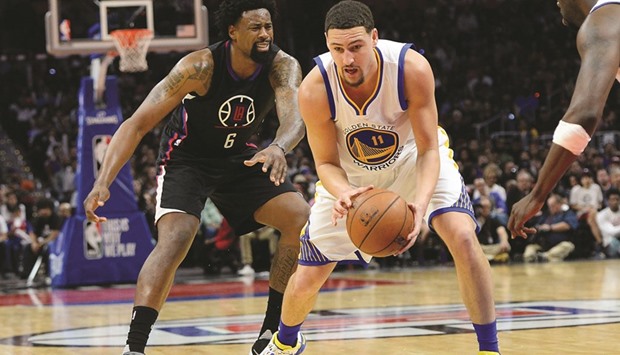 Golden State Warriors guard Klay Thompson (NO 11) steals the ball from Los Angeles Clippers center DeAndre Jordan in the second half of the game at Staples Center. PICTURE: USA TODAY Sports