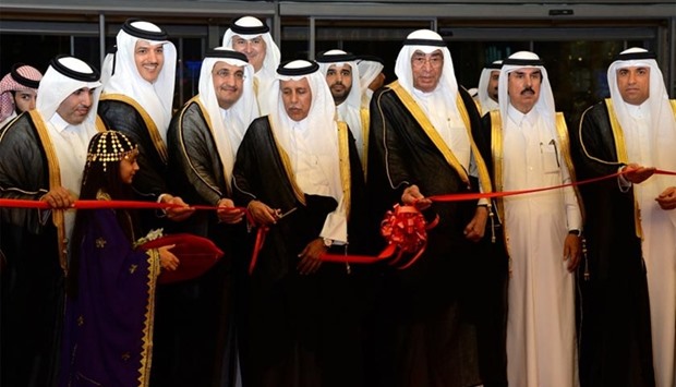 HE the Deputy Prime Minister and Minister of State for Cabinet Affairs Ahmed bin Abdullah bin Zaid al-Mahmoud inaugurating the 13th Doha Jewellery and Watches Exhibition at DECC on Monday as prominent jeweller and entrepreneur Hussain Alfardan and other dignitaries look on: PICTURES: Thajuddin