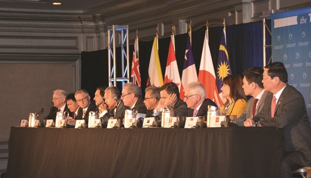 Flashback to October, 2015: trade ministers of the United States and 11 other Pacific Rim countries attending a press conference after negotiating the Trans-Pacific Partnership (TPP) trade agreement in Atlanta on October 5 last year.