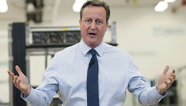 Britainu2019s Prime Minister David Cameron speaks to factory staff at the Siemens plant in Chippenham, southern England.