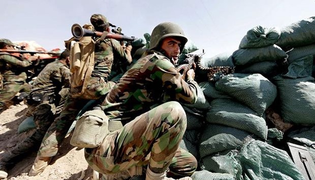Iraqi Kurdish forces fight Isis militants near Taza Khormato