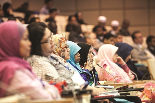 Delegates attend a seminar at the Global Islamic Finance Forum in Kuala Lumpur, Malaysia in this photo dated September 3, 2014. Malaysia plans to tap the global Islamic bond market for a second consecutive year, joining Indonesia thatu2019s planning a sale in March.