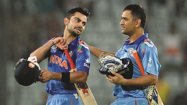 A file photo of India captain MS Dhoni (right) and Virat Kohli during their 2015 World Cup match against Pakistan at Adelaide Oval in Australia. India won the match by 76 runs.