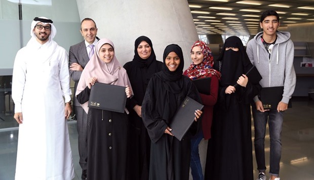 Participants of the job shadowing programme seen with Sidra officials.