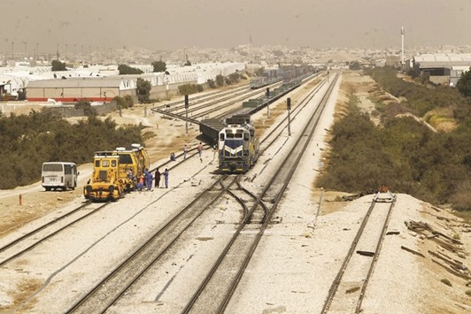 Workers are seen at a railway station in Riyadh that links Riyadh and the port of Dammam in Saudi Arabia (file). The project of a transnational rail network in the Arabian peninsula, estimated at $30bn in a 2011 report by consultants Frost & Sullivan, has suffered from delays since its announcement last decade, with the completion date already shifted to 2018 from a year earlier.