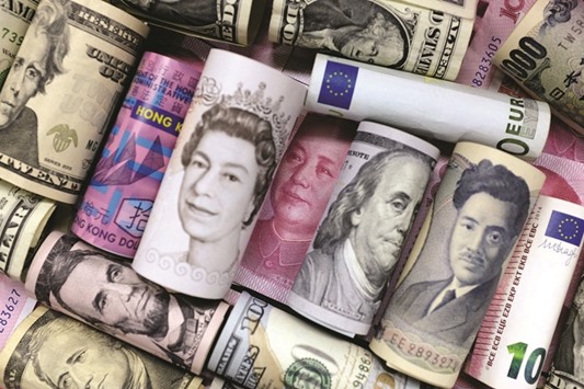 Euro, Hong Kong dollar, US dollar, yen, pound and 100 yuan banknotes are seen in this file picture illustration. China still owns the worldu2019s largest currency reserves, but it has been burning through them at such a pace that some think Beijing might soon have to allow a sharp fall in the yuan or back-pedal on liberalisation and tighten its capital controls.