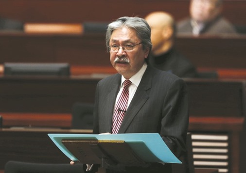 Hong Kong financial secretary John Tsang announces the annual budget report at the Legislative Council yesterday.