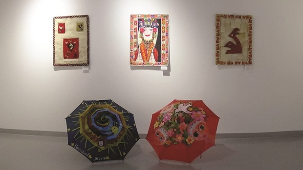 SMALL WONDERS: The artwork displays the traditonal concepts of carpet weaving, costumes and maize leaf art.