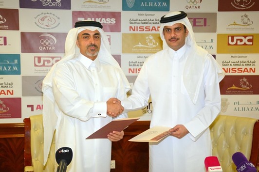 Saleh Al Hamad Al Mana Company chairman and managing director Hisham bin Saleh al-Hamad al-Mana (left) and Qatar Equestrian Federation president Hamad bin Abdulrahman al-Attiyah signed the agreement. PICTURE: Garsi Lotfi