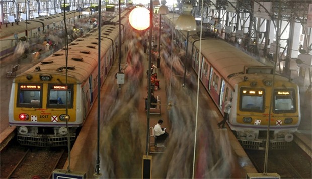 Suburban trains during the morning rush hour at Churchgate railway station in Mumbai