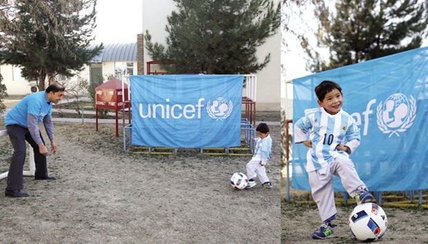 Unicef Afghanistan representative Akhil Iyer playing football with five-year-old Afghan boy Murtaza. Right: Ahmadi wearing a jersey sent to him by Argentine football star Lionel Messi.