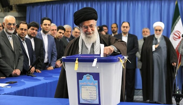 Iran's Supreme Leader Ayatollah Ali Khamenei casts his vote in Tehran on Friday.
