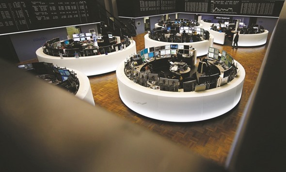 A view of the trading room at the Frankfurt Stock Exchange. Shares on Frankfurtu2019s DAX led the way yesterday, closing 1.95% up at 9,513.30 points.