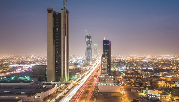 Light trails from traffic illuminate highways surrounded by residential buildings in Riyadh January 8, 2016. The kingdom is responding to a crash in oil prices, which it helped create by trying to squeeze out higher-cost producers, before the plunge deepened on Chinau2019s slump and Iranu2019s emergence from sanctions.